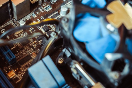 Computer board chip circuit cpu core blue technology background or texture with processors microelectronics hardware concept electronic device motherboard semiconductorの写真素材