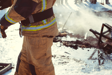 portrait of a firefighter to extinguish with waterの写真素材