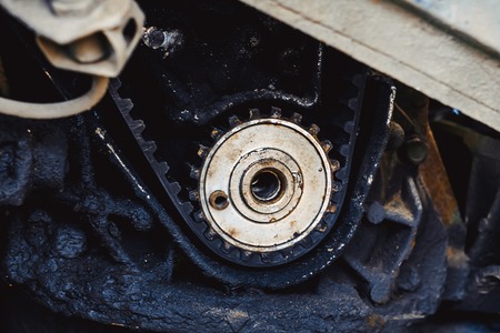 dirty old gear motor wheel, close upの写真素材