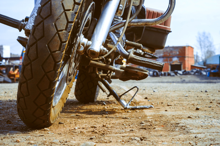 Motorcycle tire great bike-closeup of the front wheel of a large bike on the streets of Superbike technology and transport background conceptの写真素材