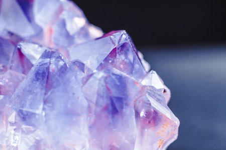 Crystal Stone macro mineral surface, purple rough amethyst quartz crystalsの写真素材