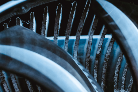 Dust on the computer pc processor cooler with mainboard and computer case fragment. Selective focus.の写真素材