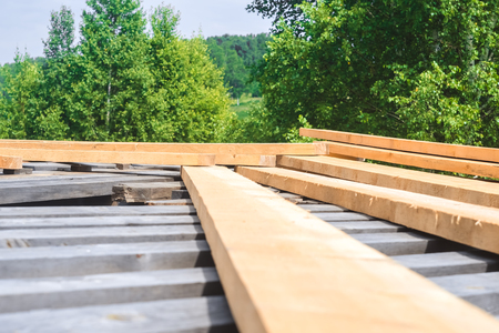 wooden boards lie on top of each otherの写真素材