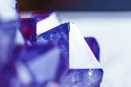 Crystal Stone macro mineral surface, purple rough amethyst quartz crystalsの写真素材