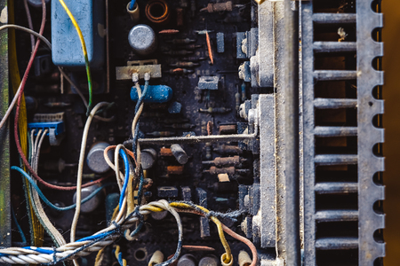 the old Soviet amplifier dismantled in the dustの写真素材