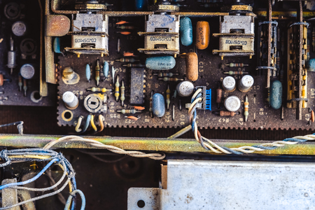 the old Soviet amplifier dismantled in the dust