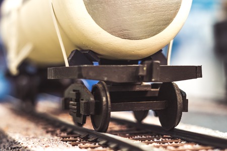 Yellow toy dump truck is isolated on the roadの写真素材