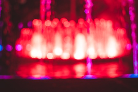 Stage lights on concert. Lighting equipment with multicolored beams.