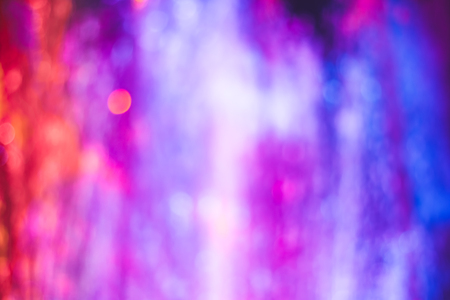 Stage lights on concert. Lighting equipment with multicolored beams.