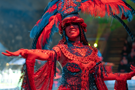 Novokuzneck, Russia - 22.09.2018: girl in a carnival costume with feathers