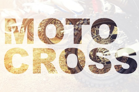Close-up of biker sitting on motorcycle in starting point before the start of the raceの写真素材