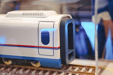 Miniature toy model of modern train crossing bridgeの写真素材