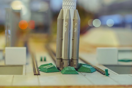 Black and white multistage space rocket model, on a miniature model of the cosmodromeの写真素材