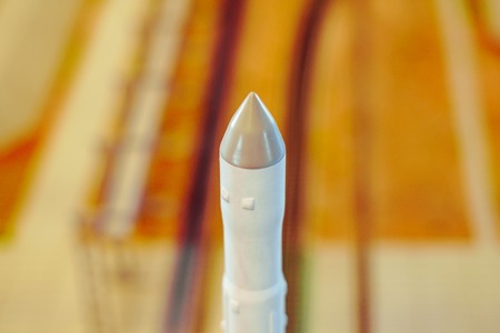 Black and white multistage space rocket model, on a miniature model of the cosmodromeの写真素材