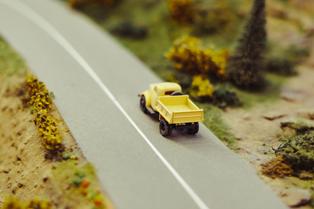 City street maquette, roads with cars, evening illumination. City architectural modelの写真素材