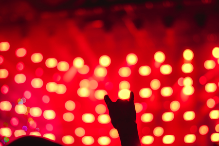 Effects blur Concert, disco dj party. People with hands up having funの写真素材