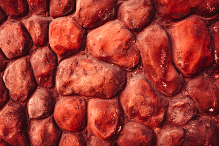 texture of red stone wall background.の写真素材