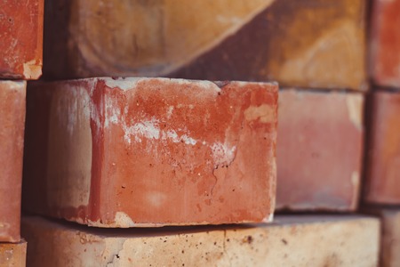 Conceptual image of red bricks pileの写真素材