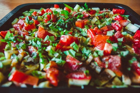 tray with vegetable stew pulled out of the ovenの写真素材