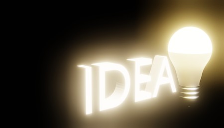 3D lettering idea and burning lamp in the darkの写真素材
