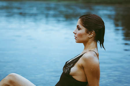 face girl lying in the waterの写真素材