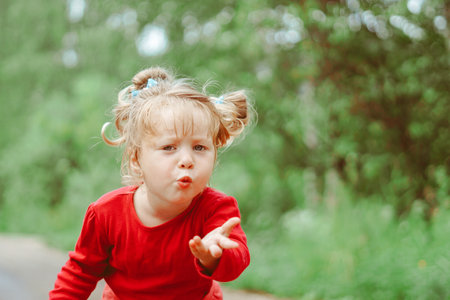portrait of a little girl in nature