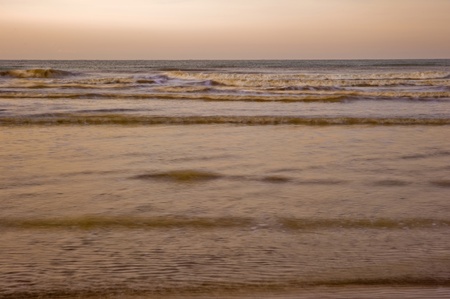 Early morning sunrise on deserted beach