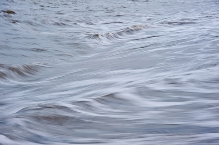 Background texture of rough seas witth long exposure motion blurの写真素材