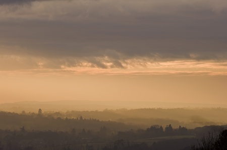 Beautiful colorful sunset over countryside landscapeの写真素材
