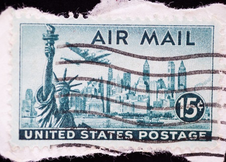 Vintage postage stamp of New York skyline with Statue of Liberty