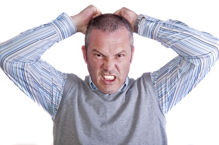 Portrait of frustrated angry mad stressed middle aged caucasian male
