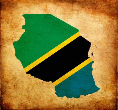 Outline map of Tanzania with flag and grunge paper effectの写真素材