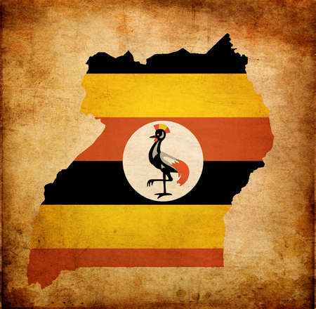 Outline map of Uganda with flag and grunge paper effectの写真素材