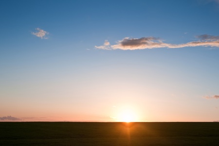 Beautiful landscape over agricultural fields with beautiful sky and invigorating sunlightの写真素材