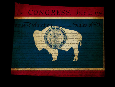 USA American Wyoming state map outline with grunge effect flag insert and Declaration of Independence overlayのeditorial素材