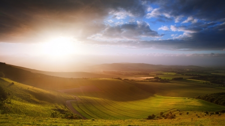Stunning landscape at sunset over rolling English countryside