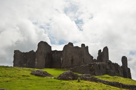 Beautiful image of medieval castle ruins in landscape with moody sky backgroundのeditorial素材