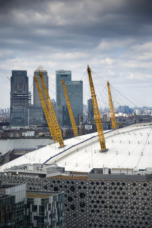 LONDON - APRIL 6: View from the Emirates Air Line cable in East London of Canary Wharf and O2 Venue...