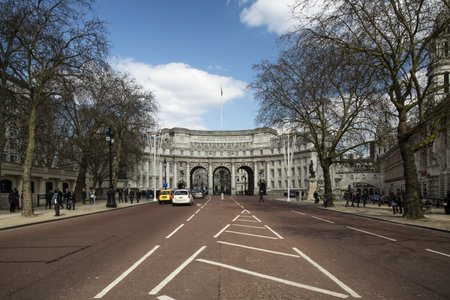 LONDON - APRIL 6: Admiralty Arch April 6, 2013 a major tourist attraction and will soon be refurbished into a luxury hotel after being sold by the British governmentのeditorial素材