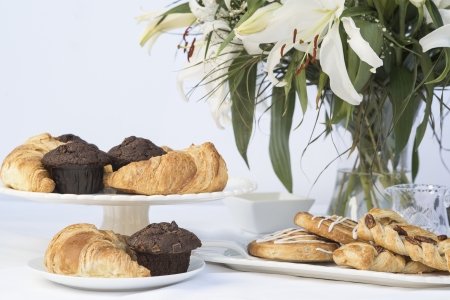 Pastries and cakes continental breakfast buffet table settingの写真素材