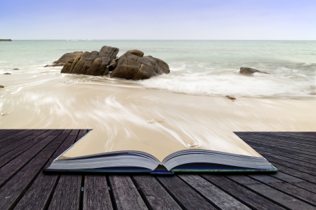 Creative concept pages of book Sennen Cove beach before sunset in Cornwall Englandの写真素材