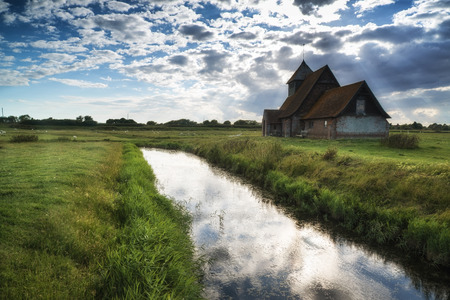 Ancient Medieval church landscape against Summer skyの写真素材