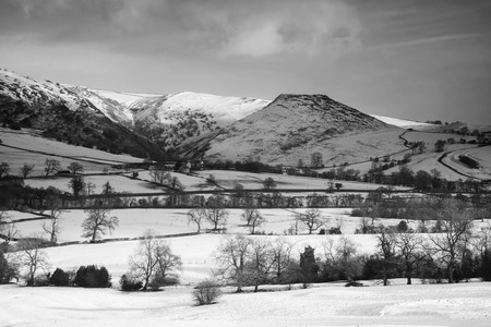 Beautiful Winter landscape snow covered rural countryside in black and white