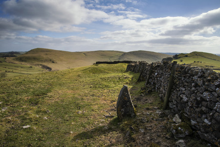 Beautiful landscape of Peak District in UK with famous stone walls