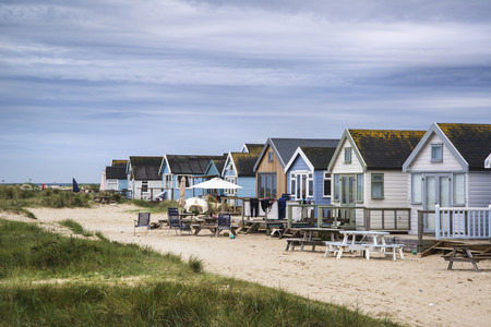 Beach huts on sand dunes and beach landscapeの写真素材