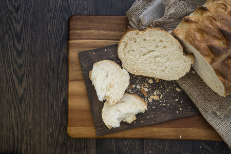 Fresh rustic loaf of bread in farmhouse setting