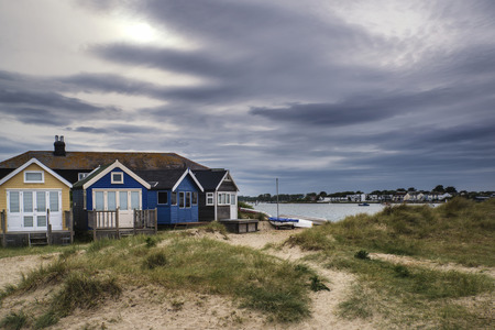 Beach huts on sand dunes and beach landscapeの写真素材