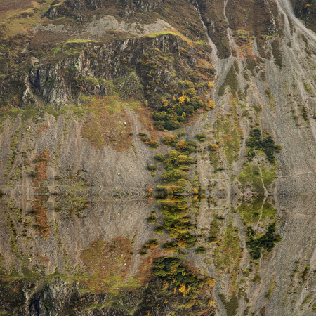 Stunning sunset landscape image of Wast Water and mountains in Lkae District in Autumn in Englandの写真素材