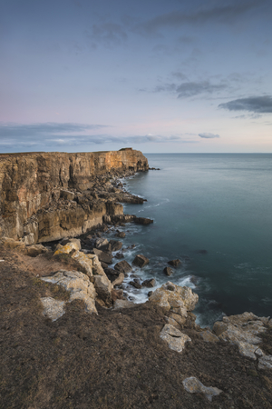 Beautiful landscape image of cliffs around St Govan's Head on Pembrokeshire Coast in Walesの写真素材