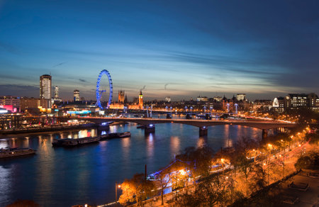 Landscape image of the London skyline at night looking along the River Thamesのeditorial素材